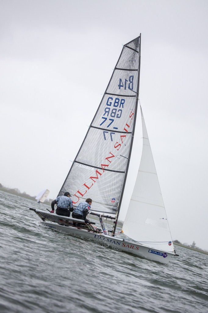 Team Ullman Sails leading the fleet round the top mark